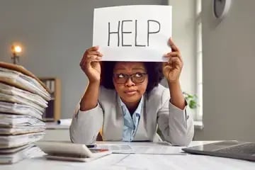 Person holding a handwritten 